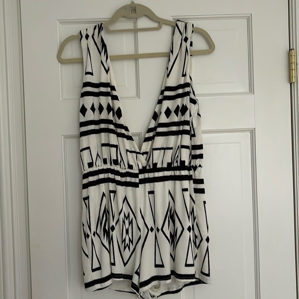 Pookie and Sebastian black and white romper